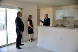 Joe Catti walking thru Habitat Home with Becky and Robert