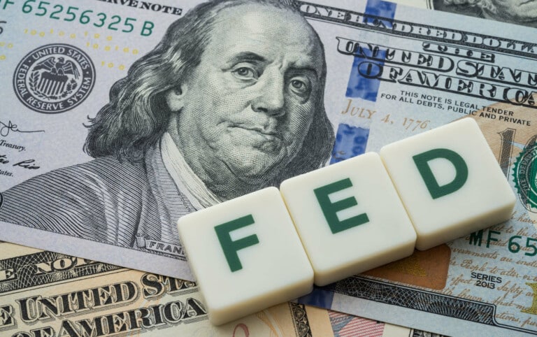 The Federal Reserve ( FED ) to control interest rates. World economy crisis, U.S. vs China trade or currency war concept. Interest rates affect the ability of consumers or businesses to access credit.