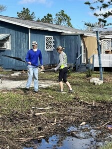 Read Sawczyn helping clean up debris