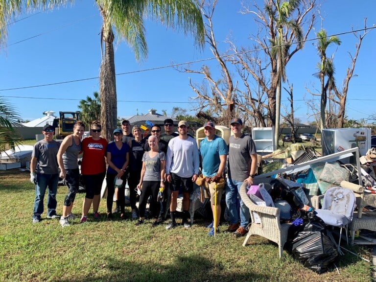 Group at home cleanup after Hurricane Ian