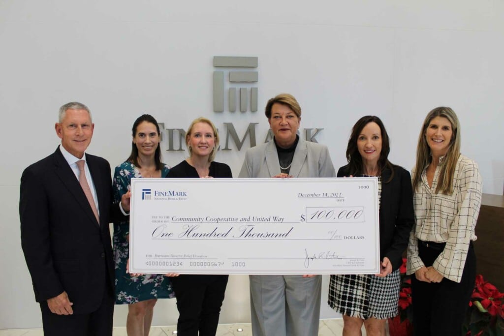 Joe Catti, Tiffany Williams, Hannah Pelle, Jeannine Joy, Stefanie Ink Edwards, Jessica Catti check presentation