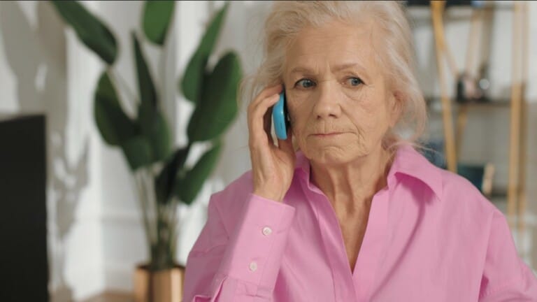 Worried Senior Woman on phone