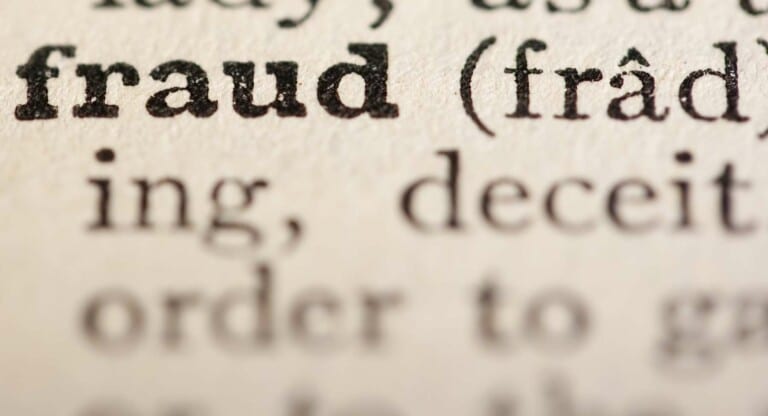 Word fraud from the old dictionary, a close up.