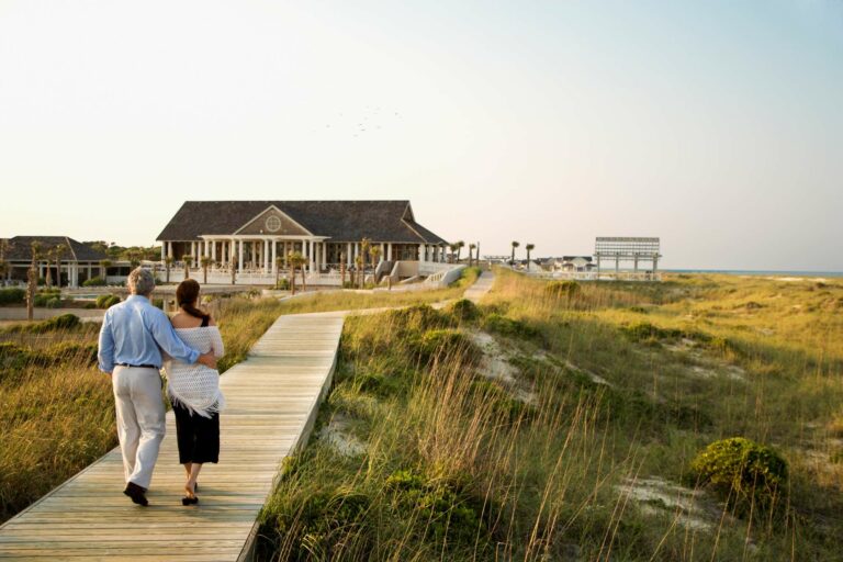 Couple walking on boardwalk