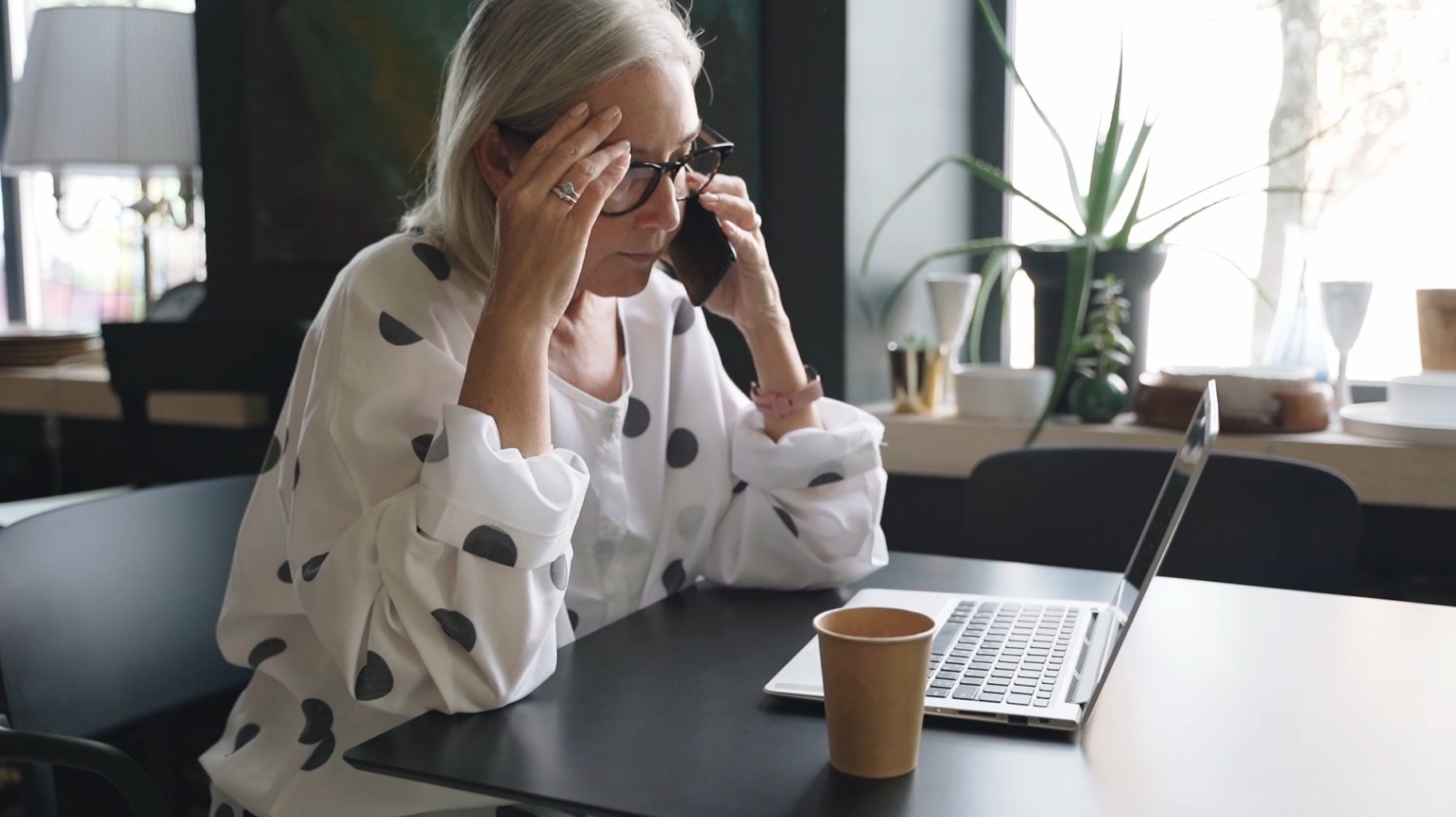 worried woman on laptop