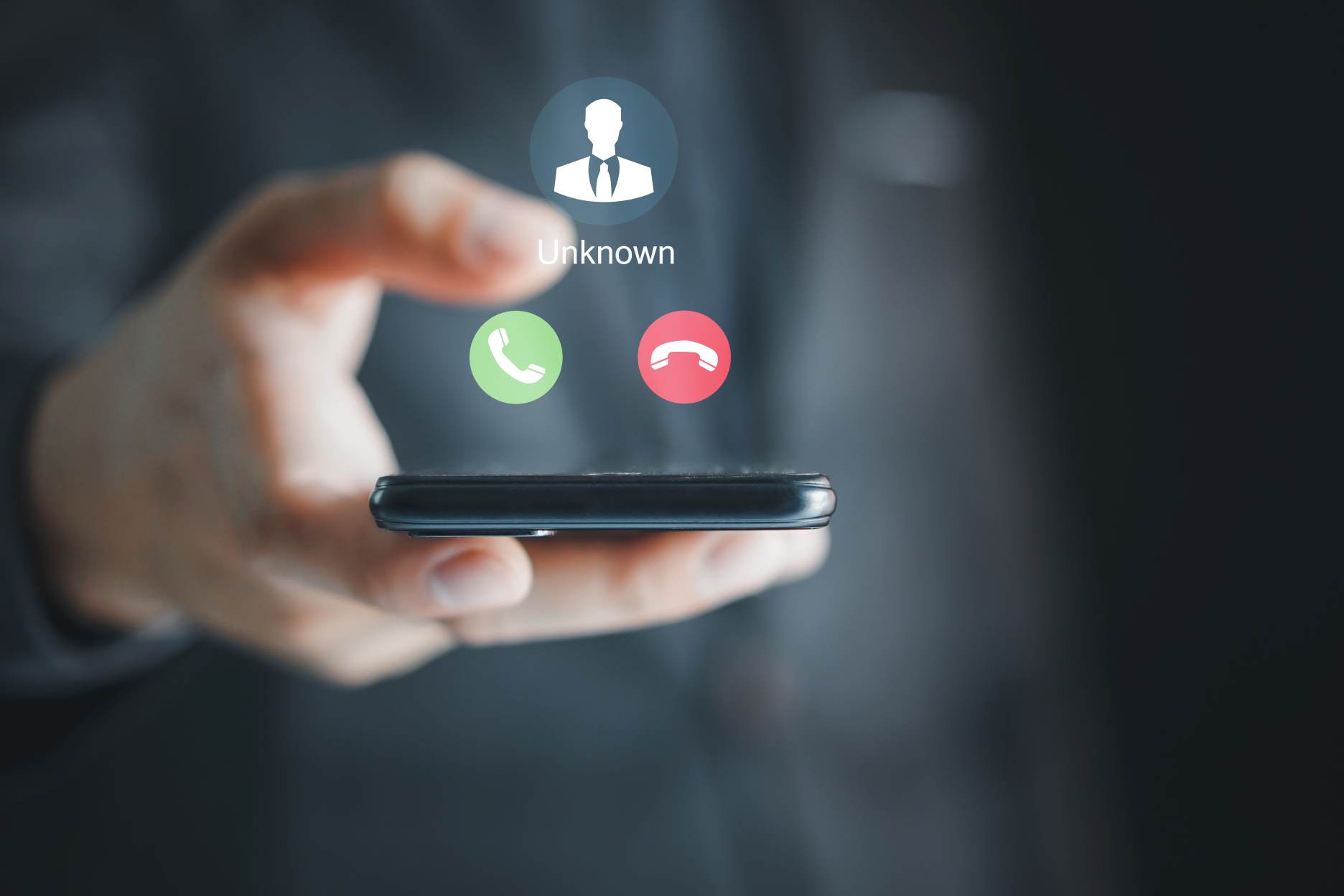 Man holding mobile phone incoming unknown call