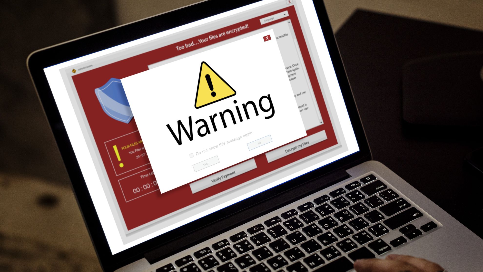 Computer laptop with hack warning pop up